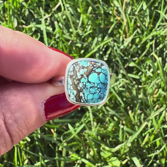 video of ring in fingers moving around showing rings sides and build