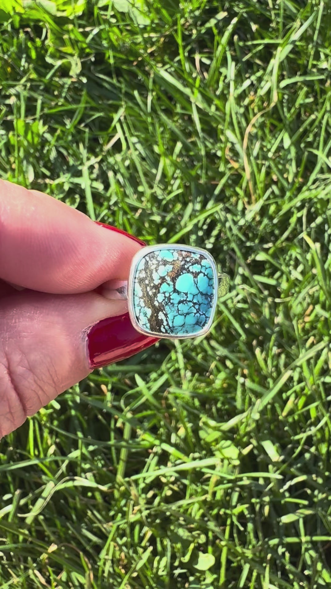 video of ring in fingers moving around showing rings sides and build